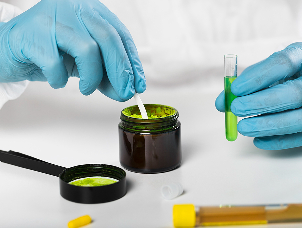 Worker inspecting mold